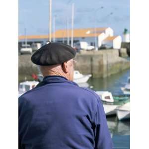 Man Sitting on the Quayside, Port Joinville Commune, Ile dYeu, Vendee 