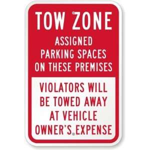  Tow Zone: Assigned Parking Spaces On These Premises 