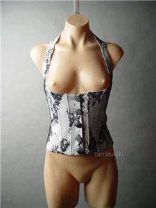 White underbust corset vest. Topped off with black lace. Elasticized 
