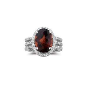  0.94 Cts Diamond & 6.88 Cts Garnet Ring in 18K White Gold 
