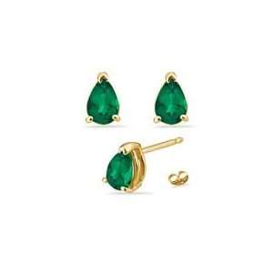  1.16 Cts Lab Created Emerald Stud Earrings in 14K Yellow 