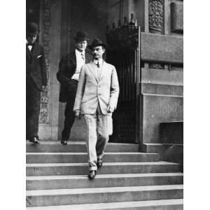 1914 photo John Purroy Mitchel, full length, facing left, walking down 