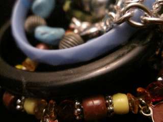   ten, new & vintage, bracelets in silver, gold, plastic, cloth & glass