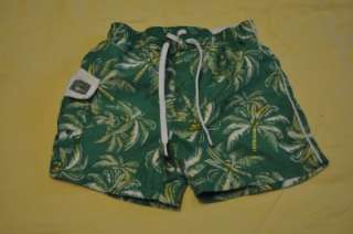 Boys size 3t swim trunks from the Childrens Place. Green with palm 